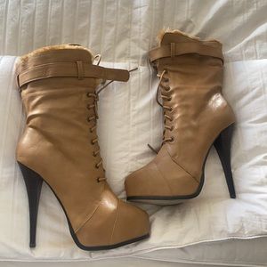Light brown bebe boots.